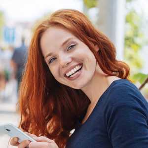 women smiling showing her beautiful smile